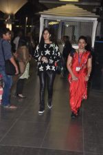 Katrina Kaif snapped at airport in Mumbai on 11th Jan 2014